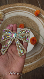 Load and play video in Gallery viewer, Rhinestone Bow Hair Pins -  Exclusive

