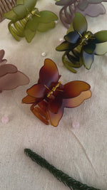 Load and play video in Gallery viewer, Matte Double Wings Butterfly Hair Claws
